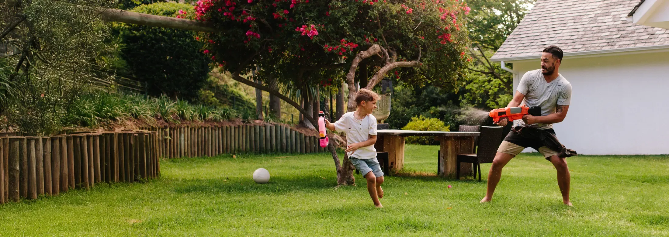father and son playing outside